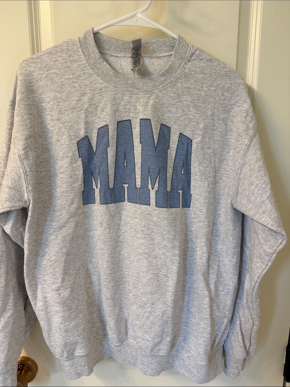 Gray Sweatshirt with Blue 'MAMA' Graphic. Size Medium.